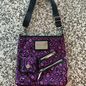 Betseyville purple cheetah print crossbody